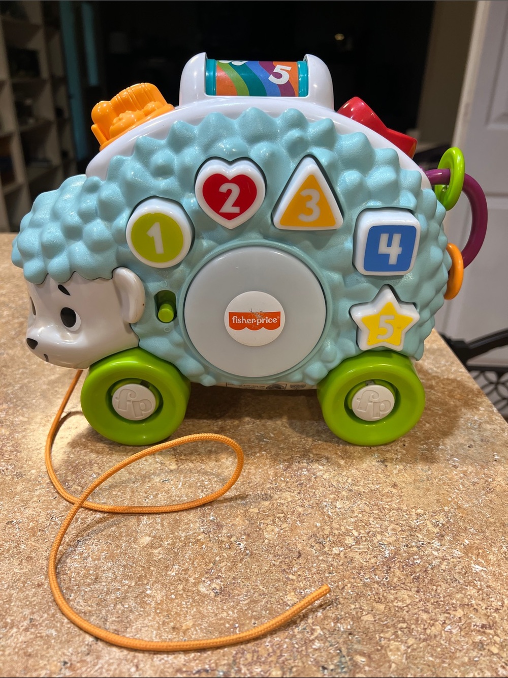 Fisher-Price Light Blue Hedgehog Pull-Along Learning Toy with Green Wheels
